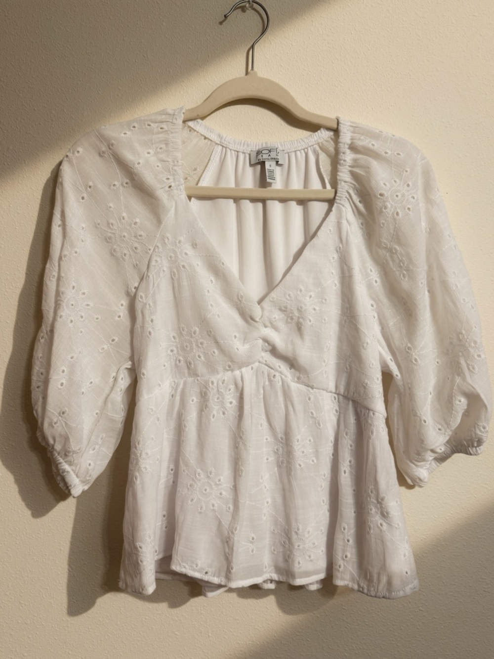 sofia by sofia vergara White Eyelet V-Neck Peplum Blouse